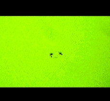 A sunspot typical of a weak Sun (Perl 60mm refractor with a solar filter in sheet at the instrument's aperture, and a Perl Echorius 1.3 Webcam; home observatory)