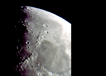 A fine view of lunar northern areas at First Quarter (Perl 60mm refractor and a Perl Echorius 1.3 Webcam; picture stacked with RegiStax and processed into a image editor; home observatory)