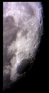 One day after Full Moon, a fine view of Mare Crisium and areas North of it! (Perl 60mm refractor and a Perl Echorius 1.3 Webcam; picture stacked with RegiStax and edited with a image editor; home observatory; turbulence was present)