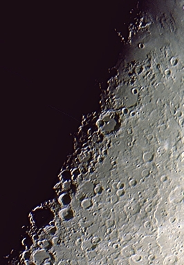 A whole series of fine craters are running along the terminator one day before First Quarter, from the Hipparchus to the Walter area (Perl 60mm refractor and a Perl Echorius 1.3 Webcam; picture stacked with RegiStax and processed into a image editor; home observatory; sky was steady in terms of seeing)