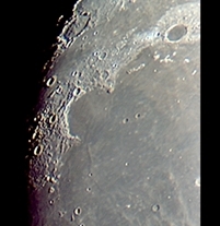 A fine view of the area of Sinus Iridum as Plato is at the upper right and Montes Recti in-between. Moon was 3 days before full (Perl 60mm refractor and a Perl Echorius 1.3 Webcam; picture stacked with RegiStax and processed into a image editor; home observatory; sky was steady in terms of seeing)