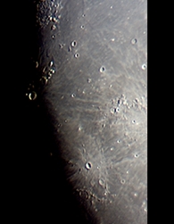The area West of Oceanus Procellarum, with Montes Carpatus center right. Moon was 3 days before full (Perl 60mm refractor and a Perl Echorius 1.3 Webcam; picture stacked with RegiStax and processed into a image editor; home observatory; sky was steady in terms of seeing)