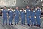 The Return to Flight crew stands in front of Discovery at Edwards Air Force Base