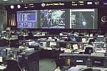 Mission Control in Houston postpones Monday Aug. 8 Discovery's landing and prepares for a Tuesday one instead