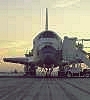 The Sun is rising as shuttle Discovery rests on runway 22, Edwards Air Force Base, Cal.