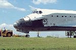 The Space Shuttle is towed back to the Orbiter Processing Facility in KSC after landing