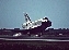 thumbnail to Editor's choice fine picture: Shuttle Discovery Touching Down / vignette-lien vers Image choisie: La navette Discovery  l'atterrissage