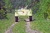 thumbnail to a view of the STS-118 mission crew performing a training aboard a M-113 armored personnel carrier as part of emergency exit training during the three-day Terminal Countdown Demonstration Test (TCDT) activities / vignette-lien vers une vue de l'quipage de la mission STS-118 s'entranant au pilotage d'un vhicule blind dans le cadre de l'entranement  l'vacuation d'urgence de la navette spatiale