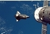 thumbnail to a view of the STS-119 mission getting close to the ISS for docking (Flight Day 2) / vignette-lien vers une vue de la mission STS-119 s'apprte  s'amarrer  l'ISS (jour de vol n 2)