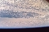 thumbnail to a view of the Atlantic Coast of Florida, Flight Day 11, with heavy clouds from the influence of Hurricane Noel, which had skirted the coast earlier / vignette-lien vers une vue de la cte atlantique de la Floride (jour de vol n 11) couverte de nuages ds  l'ouragan Noel qui avait frl la cte plus tt