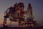 Shuttle Discovery arrived at launch pad 39B, with its rotating structure, May 18-19