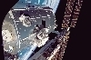 thumbnail to a view of the second spacewalk performed at the ISS during the STS-122 mission, with an astronaut working about the ESA Columbus module, as the ISS is back to daylight / vignette-lien vers une vue de la seconde sortie dans l'espace accomplie par la mission STS-122; un astronaute travaille sur le module europen Colombus -l'ISS est revenue du ct clair de la Terre