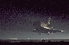 thumbnail to a view of a ghostly landing on runway 15 at the Kennedy Space Center, Florida, for the Space Shuttle mission STS-123, on March 26th, at 8:39:08 p.m. EDT / vignette-lien vers une vue de la mission STS-123 atterrissant, de nuit, au Kennedy Space Center, le 26 mars 2008,  20h 39, heure de la cte est amricaine