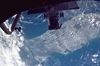 thumbnail to a view of the fourth spacewalk, on Sunday, May 17th (Flight Day 7). The Florida peninsula is seen under the Space Shuttle / vignette-lien vers une vue de la quatrime sortie dans l'espace (dimanche 17 mai, jour de vol n7). On voit la Floride en-dessous la navette