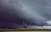 thumbnail to a view of storm clouds approaching Launch Pad 39A at NASA's Kennedy Space Center during one of the launch attempts for the STS-127 mission / vignette-lien vers une vue d'un orage menaant le pas de tir 39A du Kennedy Space Center durant l'une des tentatives de lancement de la mission STS-127
