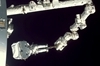 thumbnail to a view of the astronauts transporting parts to the station's External Stowage Platform 3 during the 2nd spacewalk of the mission / vignette-lien vers une vue des astronautes transportant des lments vers la plate-forme de stockage extrieure n 3 au cours de la 2me sortie dans l'espace