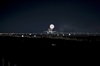 thumbnail to a view of shuttle Endeavour landing at the Shuttle Landing Facility at NASA's Kennedy Space Center, FLA. at 10:20 p.m. (EST) on Feb. 21, 2010, with the drag chute deployed / vignette-lien vers une vue de la navette Endeavour atterrissant sur la piste de la Shuttle Landing Facility du Kennedy Space Center, en Floride, le 21 fvrier 2010,  22h 20, heure d'hiver de la cte est amricaine, le parachute de freinage tant dploy