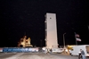 thumbnail to a view of the payload transportation canister containing the Node 3 and Cupola approaching Launch Pad 39A / vignette-lien vers une vue du container de chargement de la navette, qui contient le Node 3 et la Cupola, s'approchant du pas de tir pour tre charg dans la soute de la mission STS-130