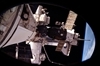 thumbnail to a view of the STS-131 third and final spacewalk session as astronauts are working near the Quest airlock. A docked Russian Soyuz spacecraft and space shuttle Discovery are seen too on Flight Day 9
 / vignette-lien vers une vue de la troisime et dernire sortie dans l'espace de la mission STS-131. Les astronautes travaillent prs du sas Quest. Se voient aussi un Soyouz et la navette Discovery (jour de vol n9)