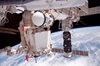 thumbnail to a view of the Russian-built Mini-Research Module 1 (MRM-1) is attached through the station's robotic Canadarm2 to the Earth-facing port of the Zarya Functional Cargo Block (FGB) of the ISS. This is the second module of a series of new Russian pressurized components / vignette-lien vers une du module russe MRM-1 (Mini-Research Module 1) install  l'ISS au ct Terre du module Zarya via le bras robotique Canadarm2 de la station spatiale. Il s'agit du second module russe de ce type