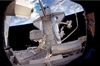thumbnail to a view of a astronaut of the Space Shuttle STS-133 participating in the mission's second spacewalk or extravehicular activity (EVA) / vignette-lien vers une vue d'un astronaute participant  la 2me sortie dans l'espace (ou extravehicular activity, EVA) de la mission STS-133