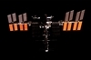 thumbnail to a view of the ISS as seen from space shuttle Discovery when the orbiter was departing from there and flying around / vignette-lien vers une vue de l'ISS vue depuis la navette Discovery alors que celle-ci s'est dsarrime de la Station et qu'elle reste en vol relatif avec elle