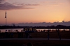 thumbnail to a view of the Sun rising and painting a colorful skyline across NASA's Kennedy Space Center in Florida and at the countdown clock area in the Launch Complex 39 area ahead of the launch of the Space Shuttle mission STS-134 / vignette-lien vers une vue du Soleil qui se lve sur l'horizon du Kennedy Space Center ainsi que sur la zone de l'horloge  compte  rebours du Launch Complex 39 alors que le lancement de la mission STS-134 de la navette spatiale se prpare