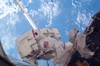 thumbnail to a view of a view of one of both astronauts who participated into the July 12th only spacewalk on the ISS of the STS-135 Space Shuttle mission / vignette-lien vers une vue d'une vue de l'un des deux astronautes qui ont particip le 12 juillet  la seule sortie dans l'espace de la mission STS-135 de la navette spatiale