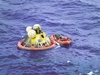 thumbnail to a view of recovery operations for the Columbia capsule after splashdown