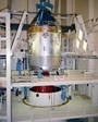 thumbnail to a view of workers lowering the CSM onto the LM/SLA in preparation for the Apollo 11 launch