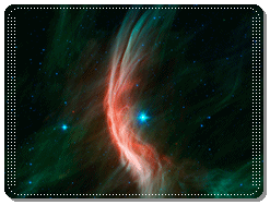 Zeta Ophiuchi, a young, six times hotter, eight 
times wider, 20 times more massive, and about 80,000 times as bright than our Sun,  which is moving at a amazing 54,000 mph in the interstellar medium is yielding a spectacular bow shock, far more obvious than the one of our own heliosphere (the bow shock further has been imaged in the infrared with NASAs Spitzer Space Telescope). The bow shock is seen here at about half a 
light-year away from the star
