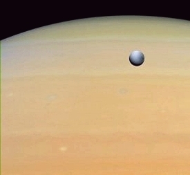 Editor's choice fine picture: Dione against Saturn's globe