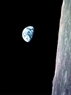 Earth rising upon the lunar horizon during the Apollo 8 mission