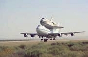 shuttle Discovery taking off on top its modified Boeing 747 Shuttle Carrier Aircraft from Barksdale AFB, La. on Aug. 19th, 2005