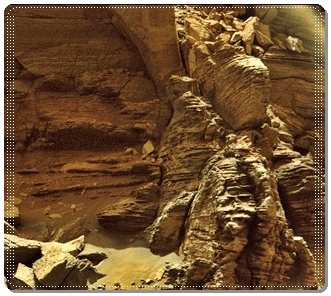 A closeup view in the 'Murray Buttes' region of lower Mount Sharp, shows finely layered rocks, belonging to buttes and mesas rising above the surface and eroded remnants of ancient sandstone that originated when winds deposited sand after lower Mount Sharp had formed. Ancient sand dunes formed and were buried, chemically changed by groundwater, exhumed and eroded to form that current view