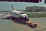 Shuttle Discovery towed into the Orbiter Processing Facility bay 3 at KSC